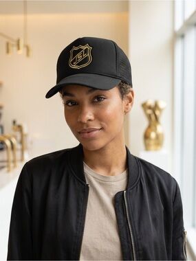 ISSI Black Mesh Trucker Cap with Red and Blue Tag